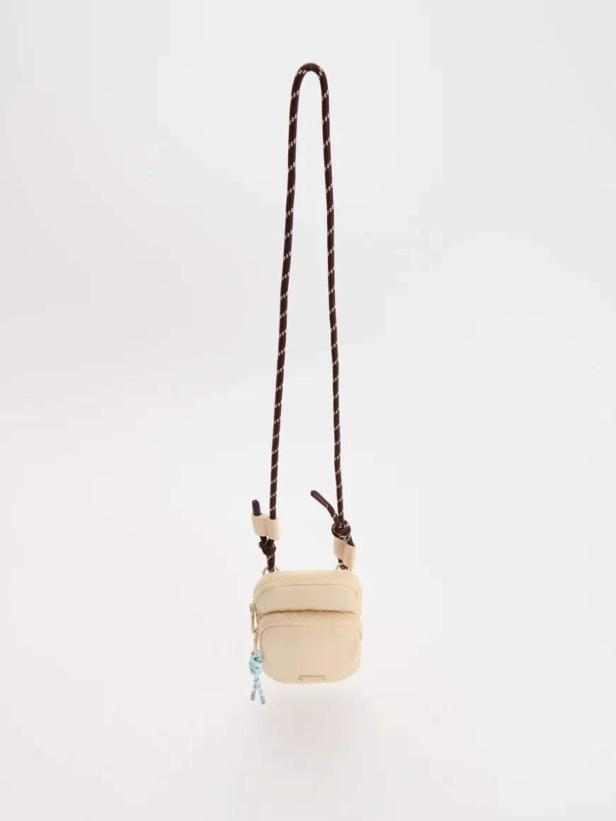 Beżowa torebka crossbody na sznurku
