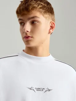 Biała bluza z nadrukiem boxy fit
