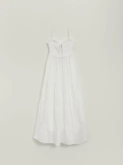 Biała sukienka maxi fit&flare z kieszeniami i falbanami