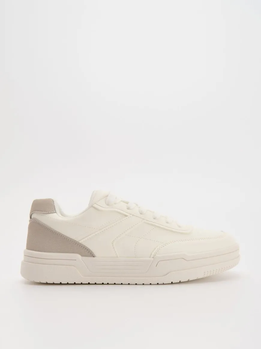 Białe sneakersy z imitacji skóry z beżowymi wstawkami