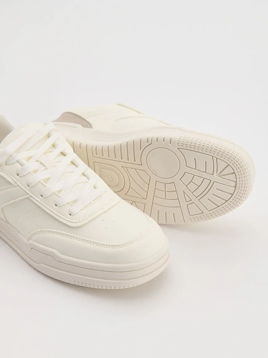 Białe sneakersy z imitacji skóry z beżowymi wstawkami
