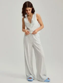 Białe spodnie wide leg mid waist z domieszką lnu