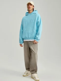 Błękitna bluza z kapturem i wypukłym nadrukiem oversize