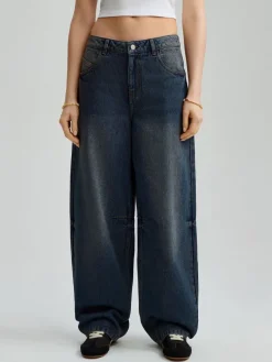 Ciemnogranatowe jeansy baggy fit z przetarciami