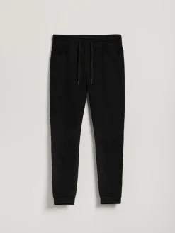 Czarne jeansowe joggery z przetarciami