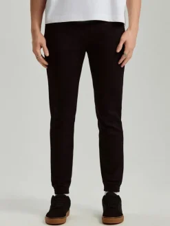 Czarne jeansowe joggery z przetarciami