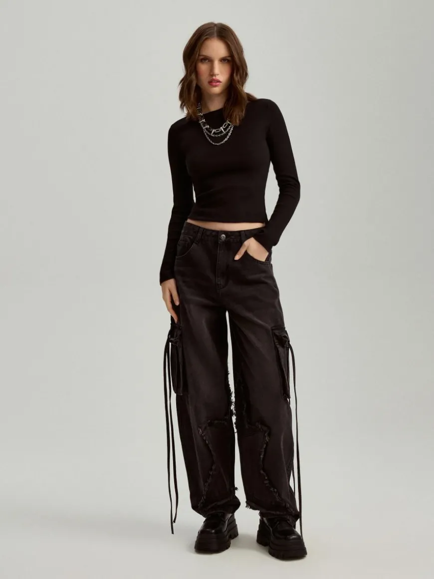 Czarne jeansy baggy cargo z motywem gwiazdy