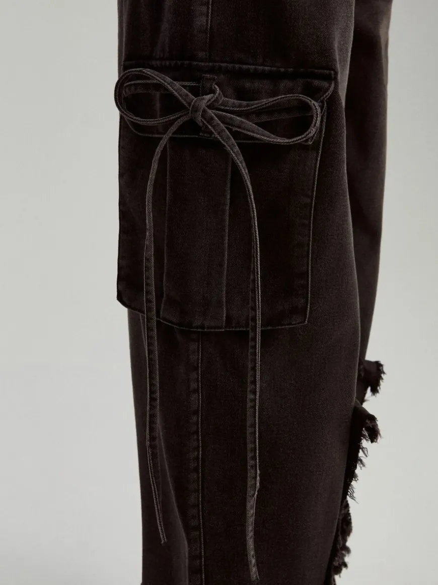Czarne jeansy baggy cargo z motywem gwiazdy