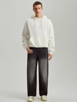 Czarne jeansy baggy fit z motywem tribal na tyle