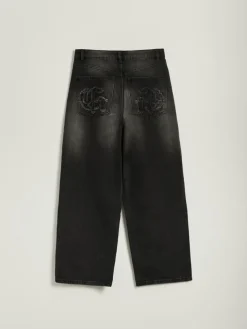 Czarne jeansy baggy fit z naszywkami na tyle
