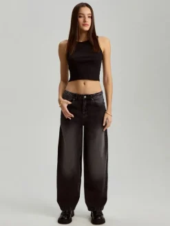 Czarne jeansy baggy fit z nadrukiem skrzydeł na tyle