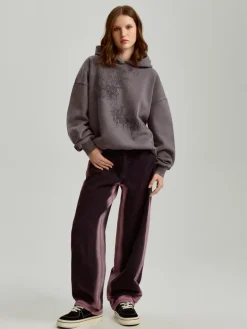 Czarne jeansy baggy fit z różowym cieniowaniem