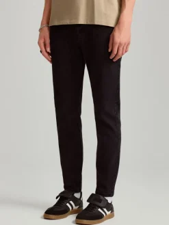 Czarne jeansy carrot fit