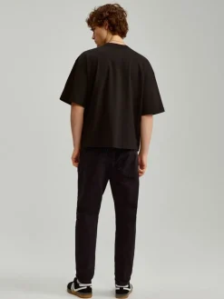 Czarne jeansy carrot fit