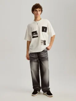 Czarne jeansy skater z mocnym spraniem