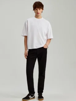 Czarne jeansy skinny fit z regularnym stanem
