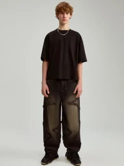 Czarne jeansy super baggy fit z naszytymi gwiazdkami