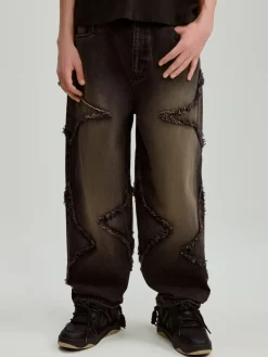 Czarne jeansy super baggy fit z naszytymi gwiazdkami