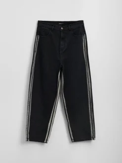 Czarne jeansy super baggy z lampasami