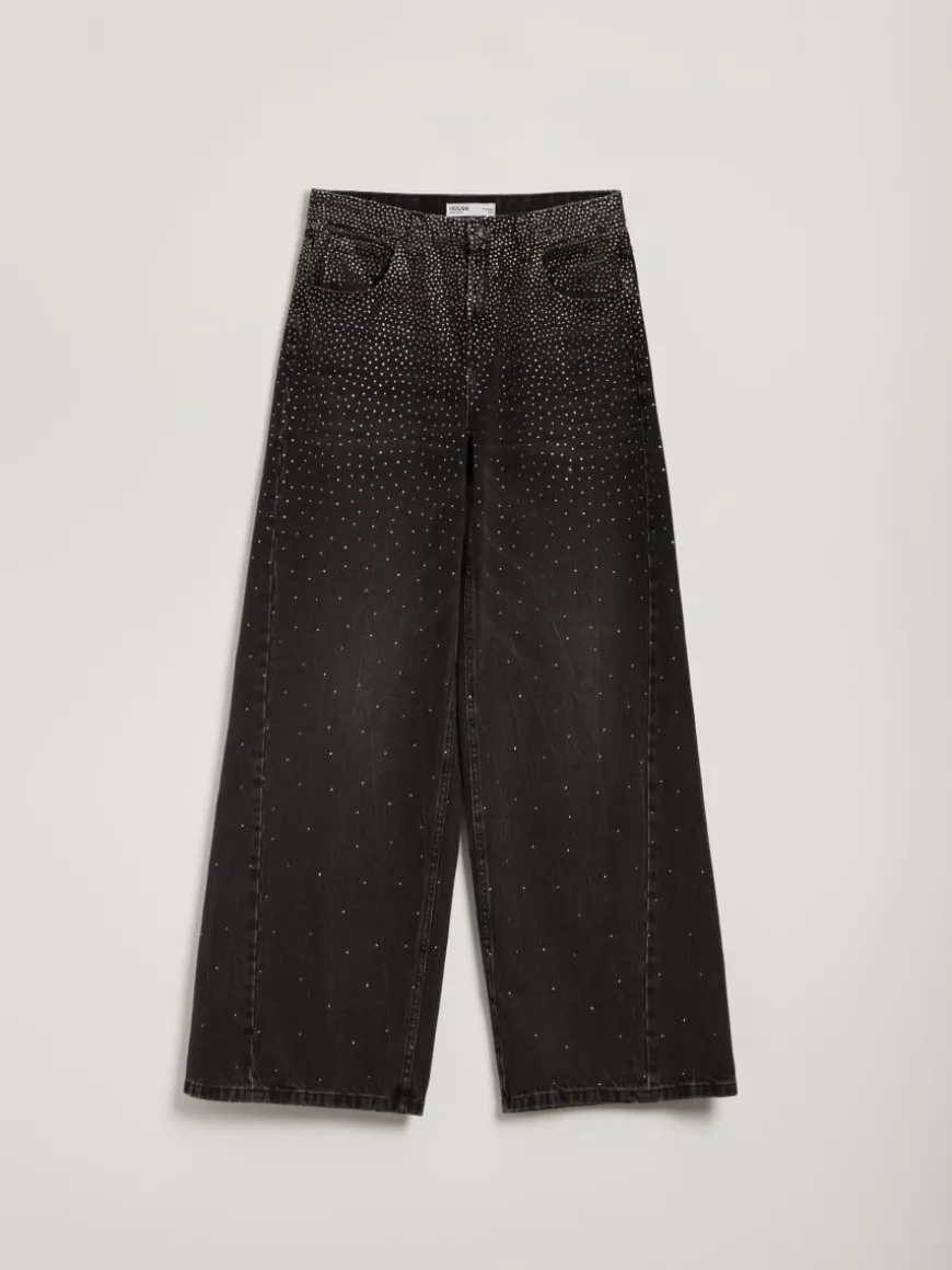 Czarne jeansy wide leg z aplikacją dżetów