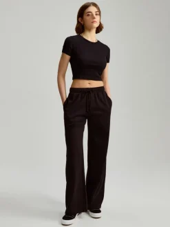 Czarne spodnie dresowe mid waist wide leg