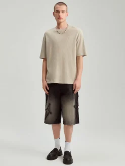 Czarne szorty jeansowe skater fit z gwiazdkami