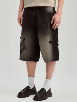 Czarne szorty jeansowe skater fit z gwiazdkami