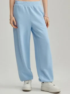 Dresowe joggery mid waist błękitne