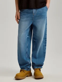Granatowe jeansy baggy fit z efektem sprania