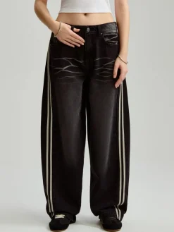 Granatowe jeansy baggy fit low waist z lampasami