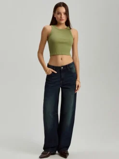 Granatowe jeansy baggy fit z przetarciami