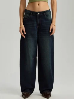 Granatowe jeansy baggy fit z przetarciami