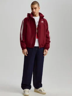 Granatowe jeansy skater fit z kontrastowymi szwami
