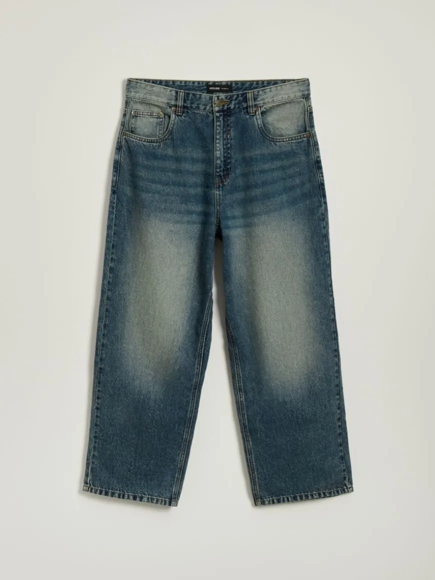 Granatowe jeansy skater fit z przetarciami
