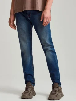 Granatowe jeansy slim fit