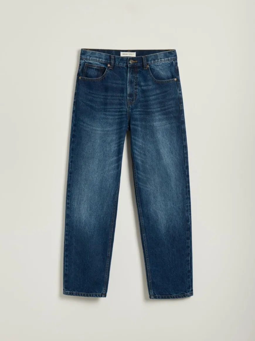 Granatowe jeansy straight fit z efektem sprania