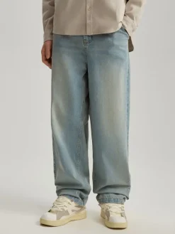 Jasnoniebieskie jeansy baggy fit z efektem sprania