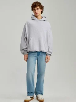 Jasnoniebieskie jeansy straight fit z efektem sprania