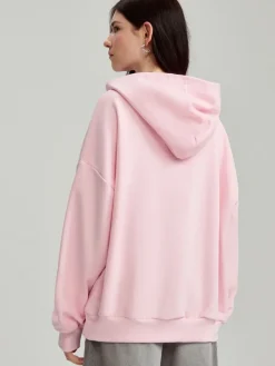 Jasnoróżowa gładka bluza loose fit z kapturem