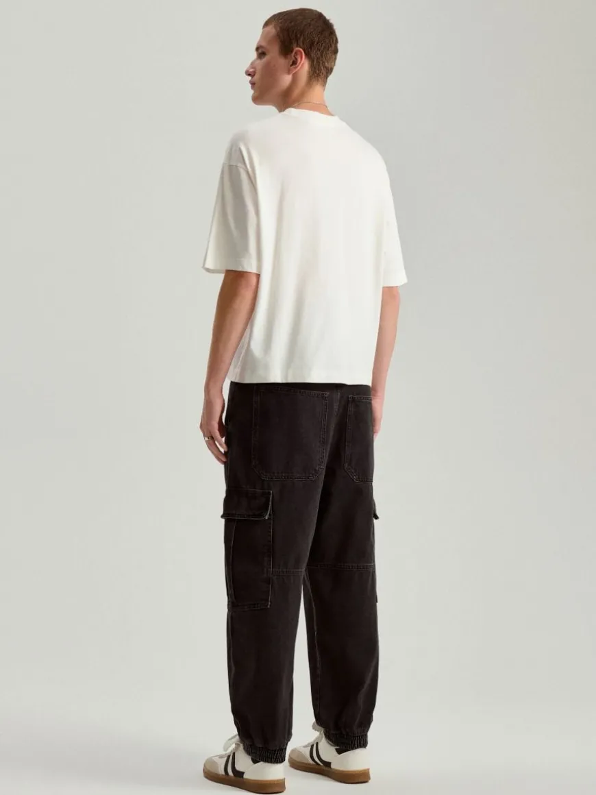 Jeansowe joggery wide leg z kieszeniami cargo