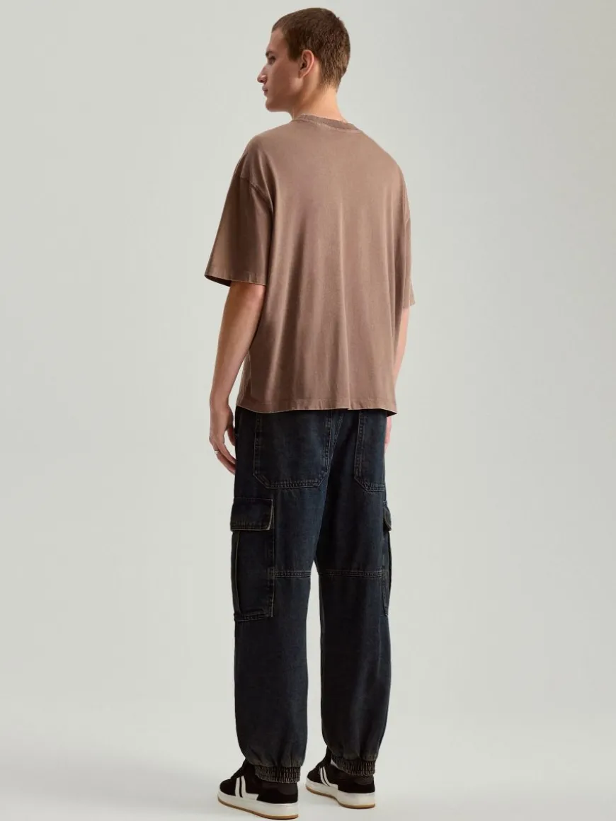 Jeansowe joggery wide leg z kieszeniami cargo