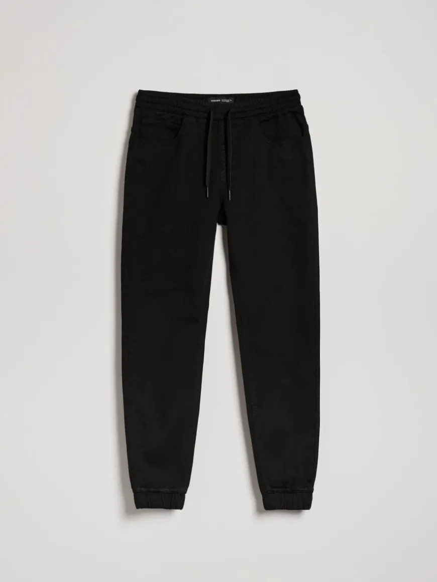 Jeansowe joggery z przetarciami czarne