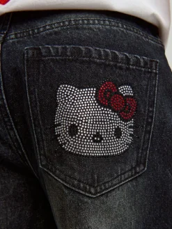 Jeansy baggy fit carpenter z motywem Hello Kitty z dżetów