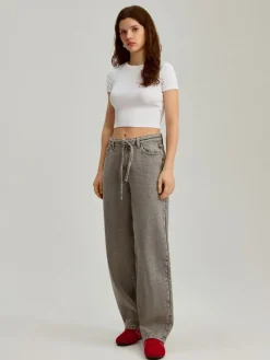 Jeansy baggy fit jasnoszare z wiązanym paskiem