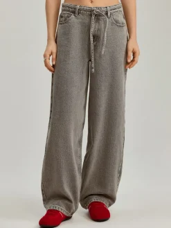 Jeansy baggy fit jasnoszare z wiązanym paskiem