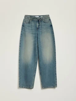 Jeansy baggy fit niebieskie z wiązanym paskiem