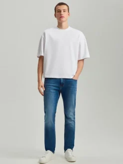 Jeansy slim fit niebieskie