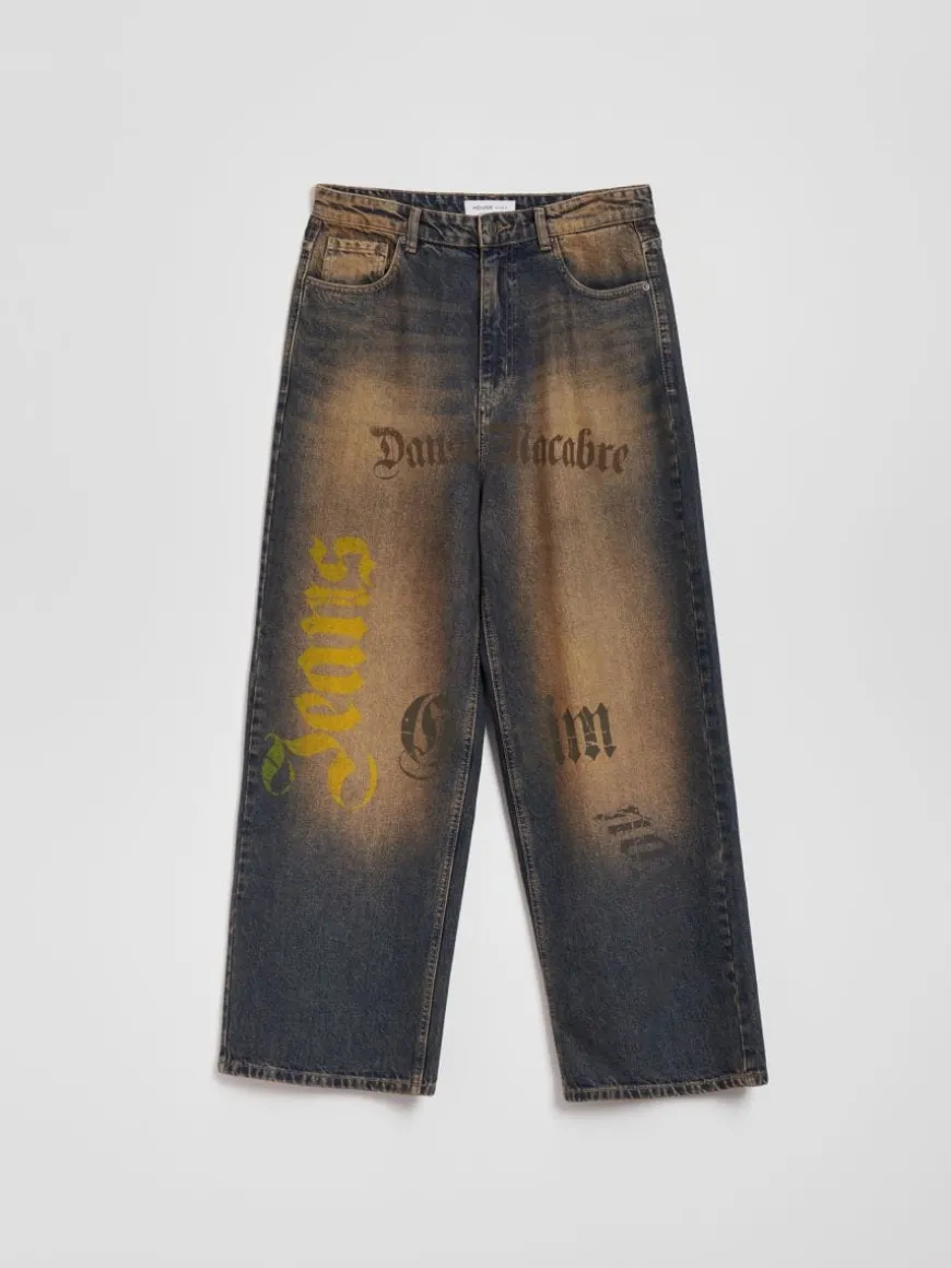 Jeansy super baggy fit w stylu dirty wash z napisami