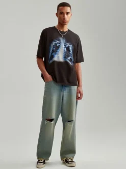Jeansy wide leg z dziurami i efektem dirty wash niebieskie