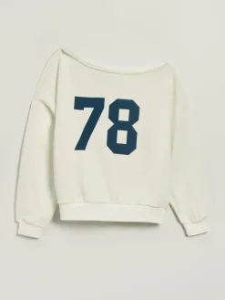 Kremowa bluza na jedno ramię z nadrukiem 78